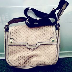 Cream and black shoulder bag.